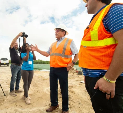 Construction workers speaking to media